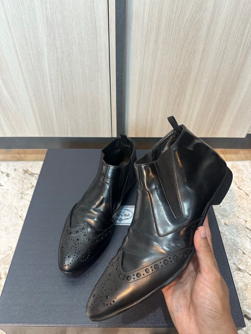 Prada Boot (Category: Dress shoes) located in Kuala Lumpur. Submitted by mr.az92 (Listing ID 1336071084, Image 2). Description: Prada Boot 9uk to let go. Condition masih cun elok. Pakai for winter trip je. Depan sharp jd muat utk 8uk bkn utk 9uk. Tapak pun msih padu elok. Comes with shoes only. Price nego! .