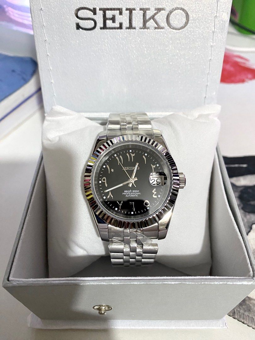 Seiko Mod Arabic Dial Black (Category: Luxury Watches) located in Manila. Submitted by jey09 (Listing ID 1336061819, Image 2). Description: Seiko Mod Date Just Diamond Black Dial •Brand new •Original Seiko Nh35 / Nh36 Movement •Jubilee Bracelet •Sapphire Glass •Open back case •With Box and Paper Bag Price: ₱5000 Mop: Gcash, Maya or Bank Transfer Courier: Lbc, Lalamove or j&t.
