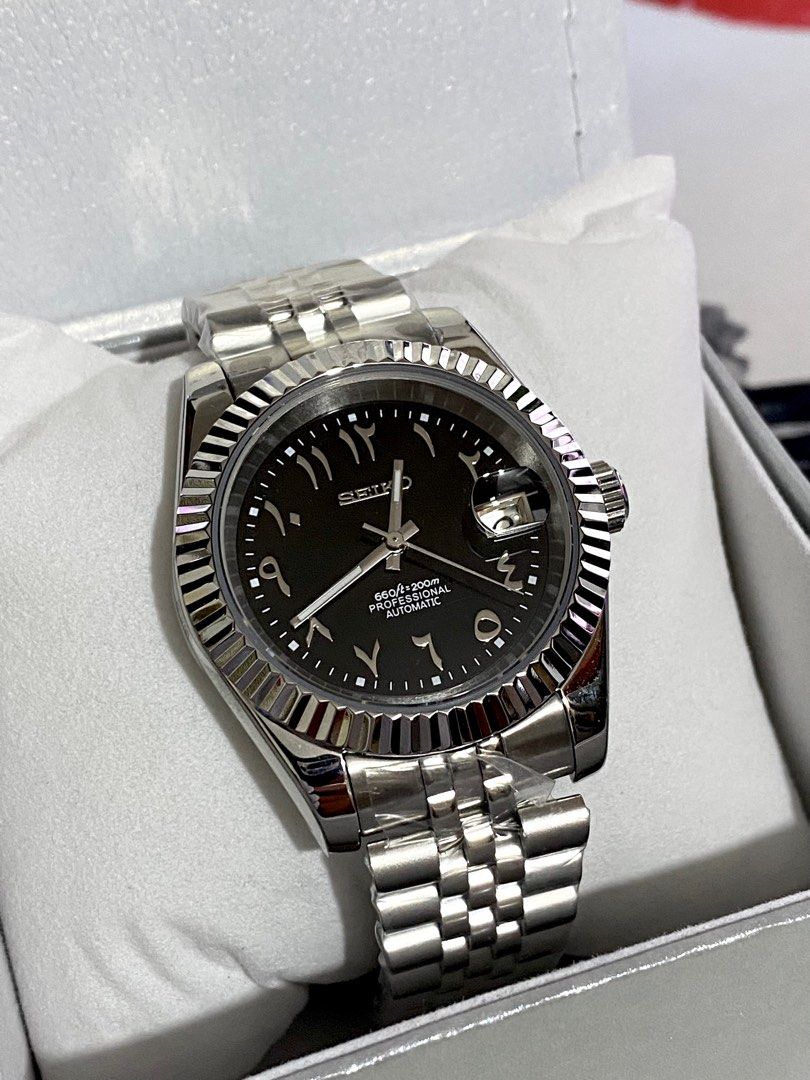Seiko Mod Arabic Dial Black (Category: Luxury Watches) located in Manila. Submitted by jey09 (Listing ID 1336061819, Image 1). Description: Seiko Mod Date Just Diamond Black Dial •Brand new •Original Seiko Nh35 / Nh36 Movement •Jubilee Bracelet •Sapphire Glass •Open back case •With Box and Paper Bag Price: ₱5000 Mop: Gcash, Maya or Bank Transfer Courier: Lbc, Lalamove or j&t.