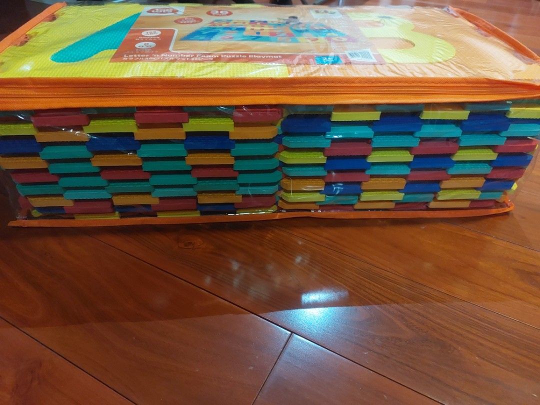 PLAYMAT for baby playpen/play area (Category: Infant Playtime) located in Manila. Submitted by jayar29 (Listing ID 1336088892, Image 3). Description: Puzzle type playmat complete A-Z and 1-10 tiles with carrying case. Mall price is 1600 at Toys R Us Buyer pays for shipping fee. Can do meet ups/free delivery near BF homes paranaque or nearby areas for sure buyers..