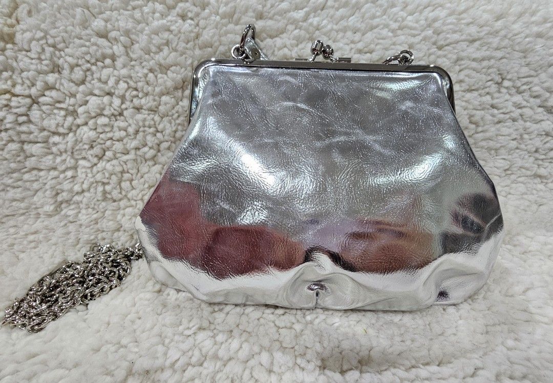 Vivienne westwood silver clutch store