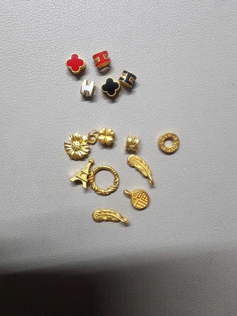 24K gold pendants (Category: Charms) located in Quezon City. Submitted by rdl09 (Listing ID 1336230175, Image 1). Description: 24K pendants all gold: 1000 each colored: 1500 each shipping shouldered by the buyer..