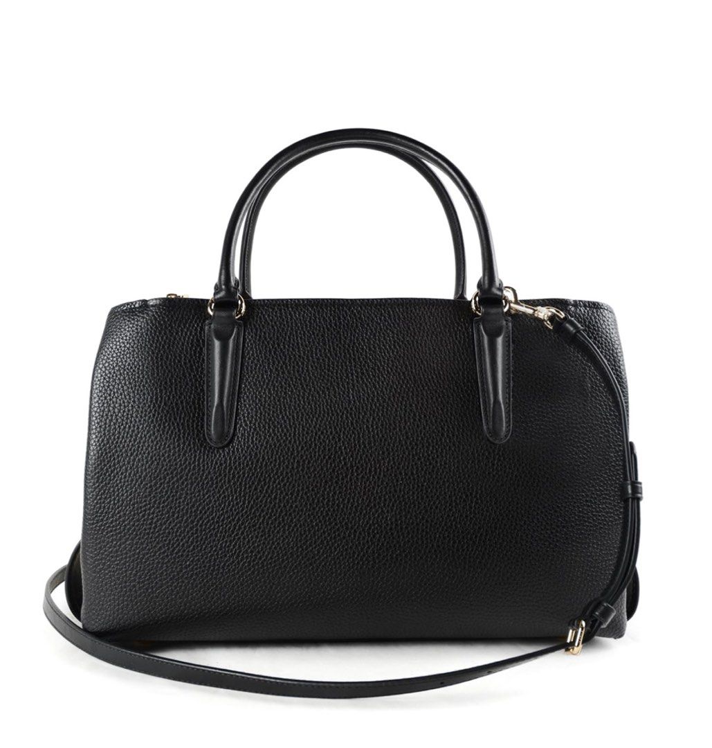 Couch (Category: Bags & Wallets) located in Kuala Lumpur. Submitted by leyla_21 (Listing ID 1336179960, Image 3). Description: Hammered leather carryall detailed with gold tone metal hardware, two handles, adjustable and detachable shoulder strap, two outer zipped pockets, one of which with twist-lock fastening, protective feet, two open compartments and a zipped one, which has an inner zipped pocket and fabric lining. .