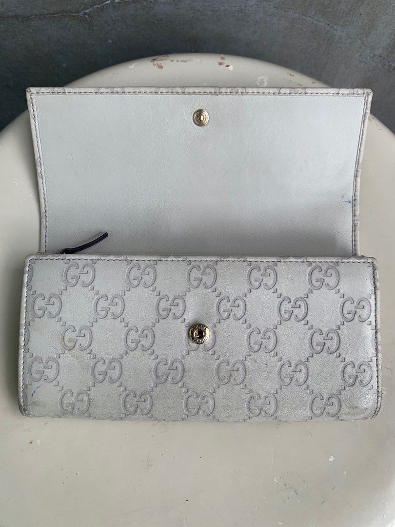 Gucci Guccissima Long Wallet (Category: Luxury Bags & Wallets) located in Baguio. Submitted by lordeidara (Listing ID 1336240220, Image 3). Description: Rank C Needs deep cleaning Stained Paint chip offs on hardware Color:Cream Material:,Leather Size on tag: Length:7.75 Width:1.5 Height:4.5 Strap Length: Number of Pockets:10.