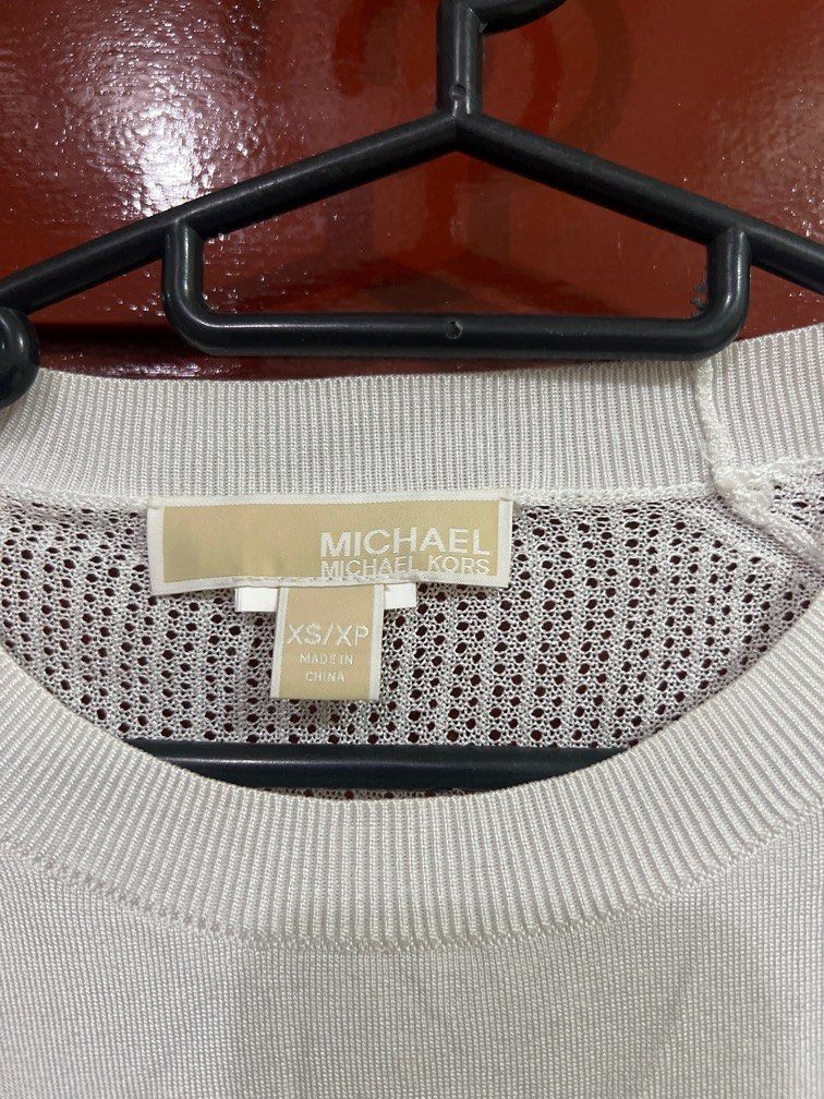 Michael Kors Outerwear (Category: Bikinis & Swimsuits) located in Valenzuela. Submitted by declutterclutter_ (Listing ID 1336289912, Image 2). Description: Flaw: visible yellow stains.