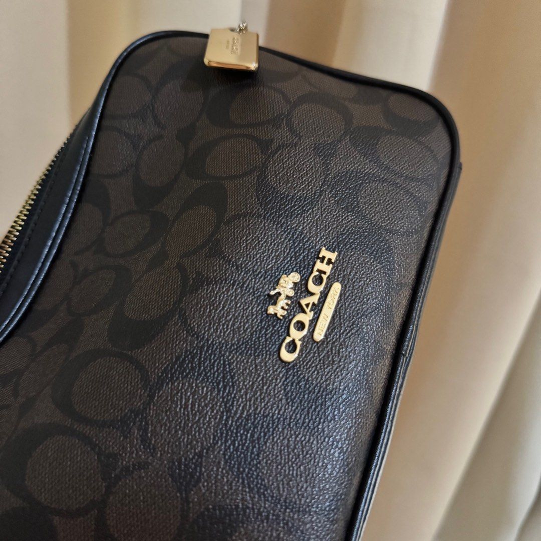 Original Coach Jamie Double Zip camera bag (Category: Luxury Bags & Wallets) located in Taguig. Submitted by closetcleanup_mm (Listing ID 1336150397, Image 1). Description: !! This is OG not mall pullout or whatsoever na tawag nila Still in good condition Rfs: too many bags PLEASEREAD!!! Brands luxury or not often have multiple manufacturers, and slight variations in stitching, materials, fonts, or hardware can occur depending on the production y