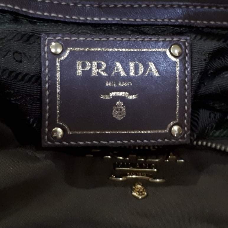Prada Tessuto Nappa Rovere Two Way Bag (Category: Luxury Bags & Wallets) located in Taguig. Submitted by esa.agustin (Listing ID 1336177543, Image 3). Description: Original Prada Tessuto Nappa Rivere nylon two way bag. With dust vag, original strap, care card and authenticity card.Made in Turkey..