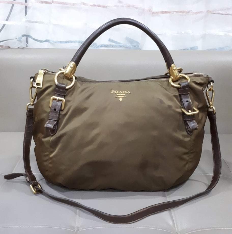 Prada Tessuto Nappa Rovere Two Way Bag (Category: Luxury Bags & Wallets) located in Taguig. Submitted by esa.agustin (Listing ID 1336177543, Image 1). Description: Original Prada Tessuto Nappa Rivere nylon two way bag. With dust vag, original strap, care card and authenticity card.Made in Turkey..