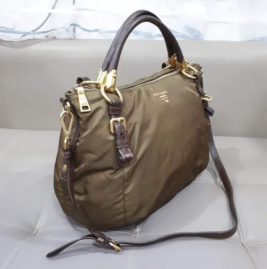 Prada Tessuto Nappa Rovere Two Way Bag (Category: Luxury Bags & Wallets) located in Taguig. Submitted by esa.agustin (Listing ID 1336177543, Image 2). Description: Original Prada Tessuto Nappa Rivere nylon two way bag. With dust vag, original strap, care card and authenticity card.Made in Turkey..