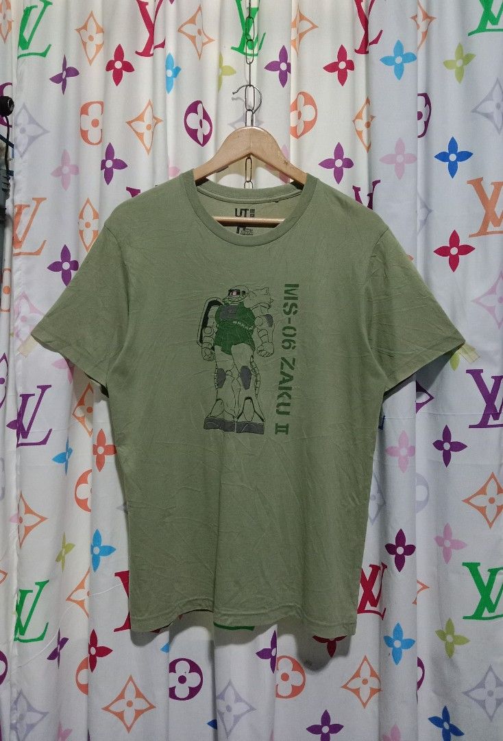 UNIQLO X GUNDAM (Category: Tshirts & Polo Shirts ) located in San Rafael. Submitted by temyongthriftv2 (Listing ID 1336314972, Image 1). Description: UNIQLO X GUNDAM Excellent condition, mabago Ganda ng kulay Laser print Large ( 21 x 28) May maliit na butas sa right sleeve.