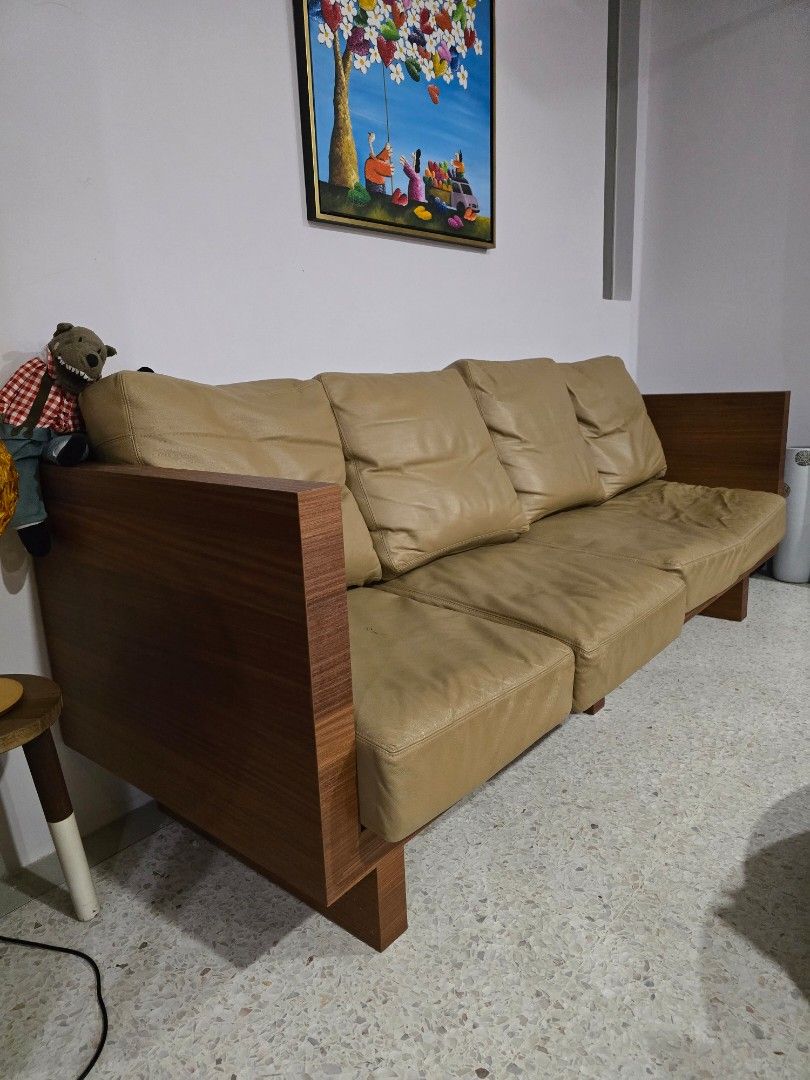 Wooden sofa with leather cushions deals