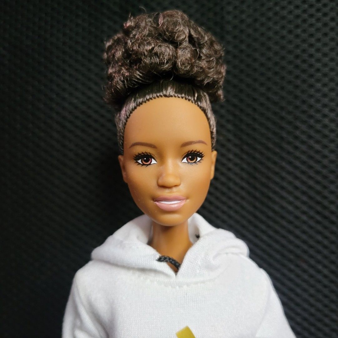 Barbie doll with curly hair (Category: Kids Toys) located in Quezon City. Submitted by aeemen (Listing ID 1336330030, Image 2). Description: Preloved, no box. Original clothes were changed to this Adidas jogger set. Doll is still in good condition. MOP: GCASH, bank transfer MOD: lalamove/grab/ J&T Buyer shoulders shipping expense. Location: Quezon City.