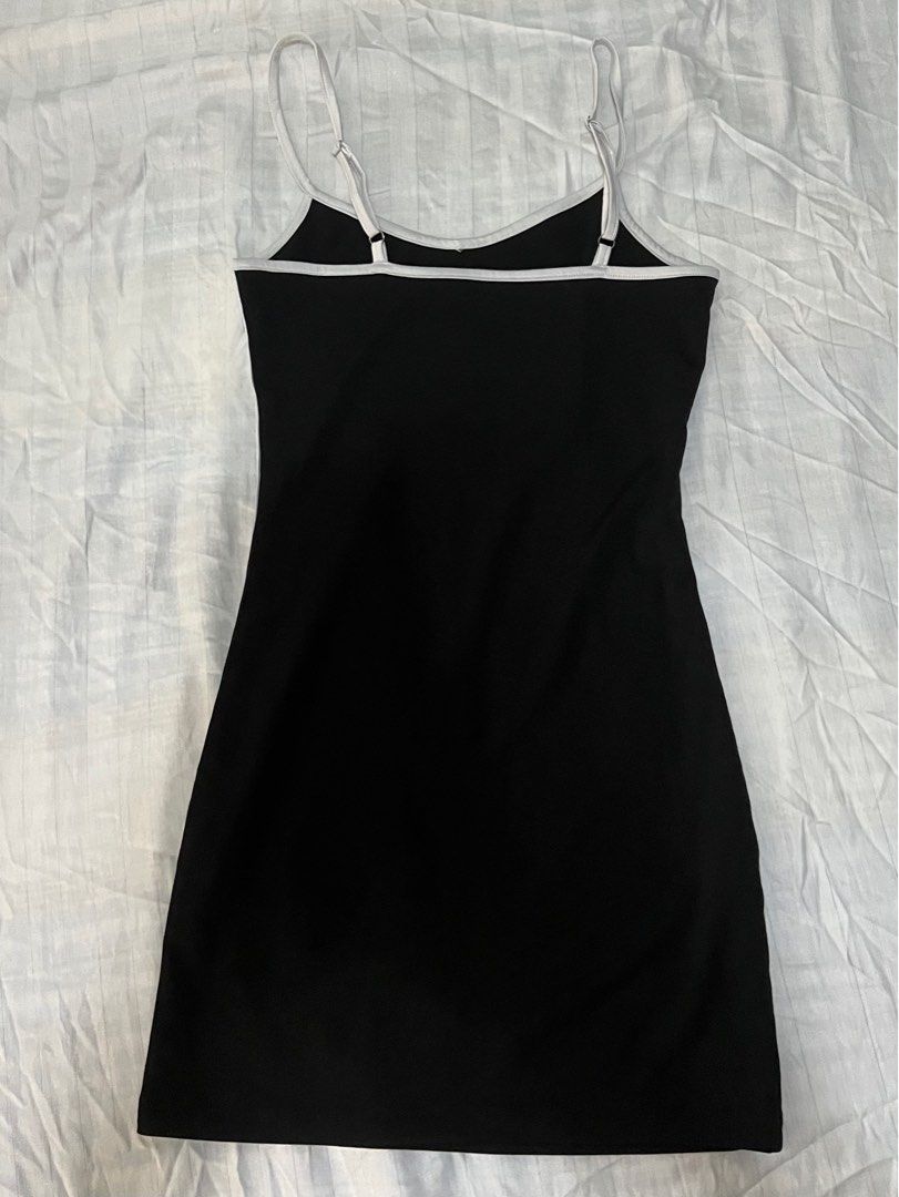 Black dress with white lining (Category: Dresses) located in Paranaque City. Submitted by flamespicks (Listing ID 1336399509, Image 2). Description: Brand: No Brand Size: XS-S Condition: Lightly Used Fabric: Cotton/Polyester slightly stretchable Rfs: Decluttering Model's Measurements Bust: 33 Waist: 25 Hips: 35 .