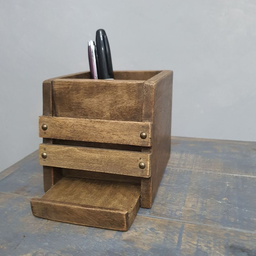 Gift idea - solid wood desk organizer with phone holder (Category: Storage Boxes & Baskets) located in Pasig City. Submitted by fine.finds (Listing ID 1271153758, Image 1). Description: Looking for gifts to give this Christmas? Look no further! This beautiful desk organizer made of solid wood with brass button accents is the perfect gift for family, friends, officemates and clients. Each piece is unique with the wood grain and character preserved