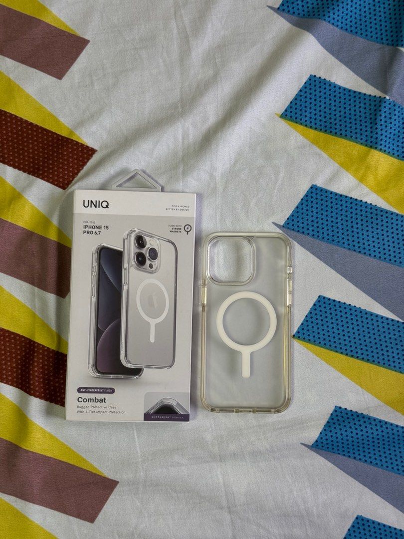 iPhone 15 Pro Max UNIQ Combat Clear Case w Magsafe (Category: Cases & Sleeves) located in Carmona. Submitted by marlaurente (Listing ID 1336391105, Image 1). Description: bought for 1,995. sobrang favorite case! matte yung likod niya, snug fit, malakas ang magsafe. may hint of yellowing lang sa may lower part pero kapag nakakabit na sa phone, barely noticeable. rfs: decluttering quezon city, timog, or biñan laguna. can do delivery!.