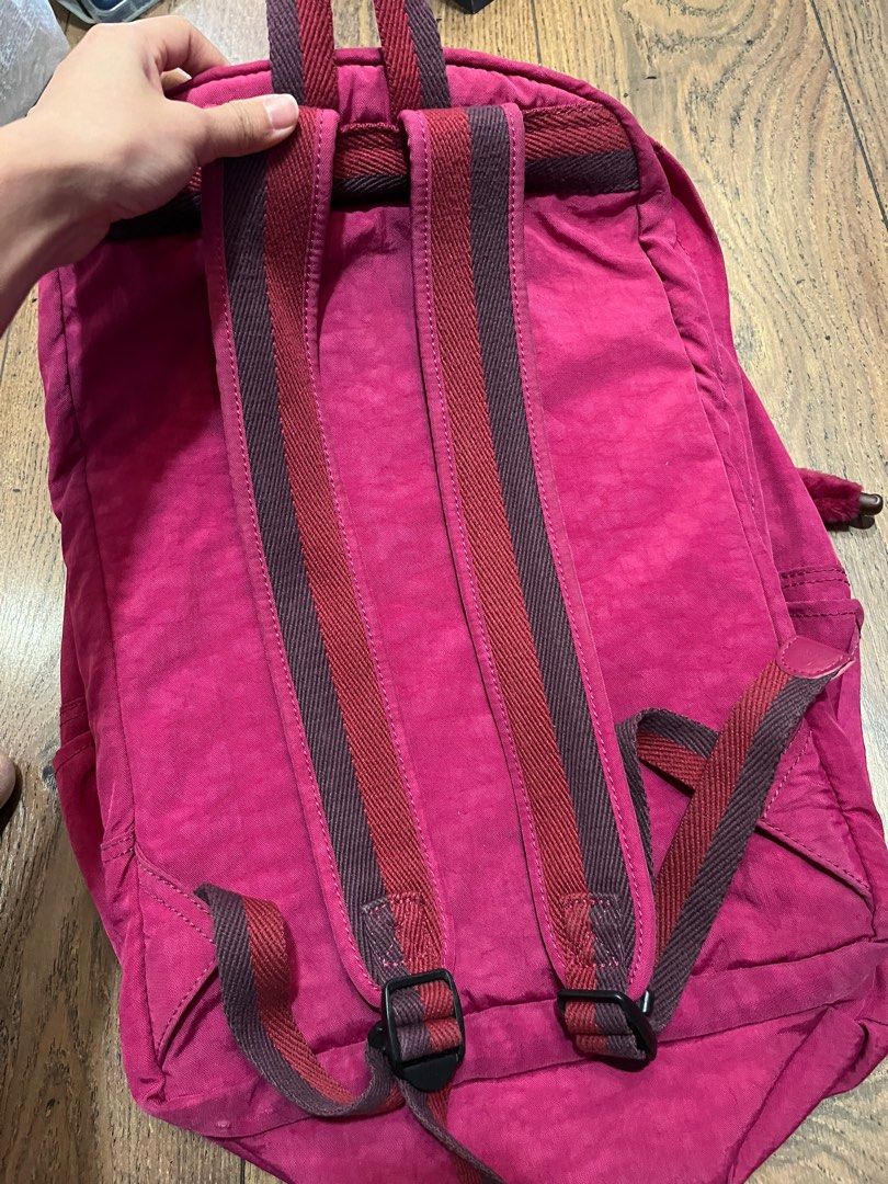 kipling backpack (Category: Backpacks) located in Singapore. Submitted by apeanut (Listing ID 1336380696, Image 3). Description: 2 zips on the body of the back, one with laptop compartment 2 front zips bottle holder on each side really roomy and sturdy - tried to capture all the noticeable flaws in the pics. overall it looks very good haven’t really tried cleaning/washing the discoloured/stained areas. i think they are may be partially removable.