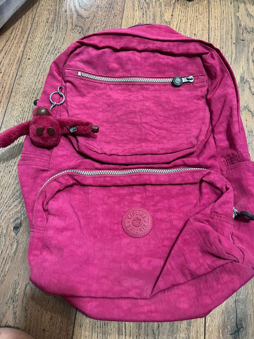 kipling backpack (Category: Backpacks) located in Singapore. Submitted by apeanut (Listing ID 1336380696, Image 1). Description: 2 zips on the body of the back, one with laptop compartment 2 front zips bottle holder on each side really roomy and sturdy - tried to capture all the noticeable flaws in the pics. overall it looks very good haven’t really tried cleaning/washing the discoloured/stained areas. i think they are may be partially removable.