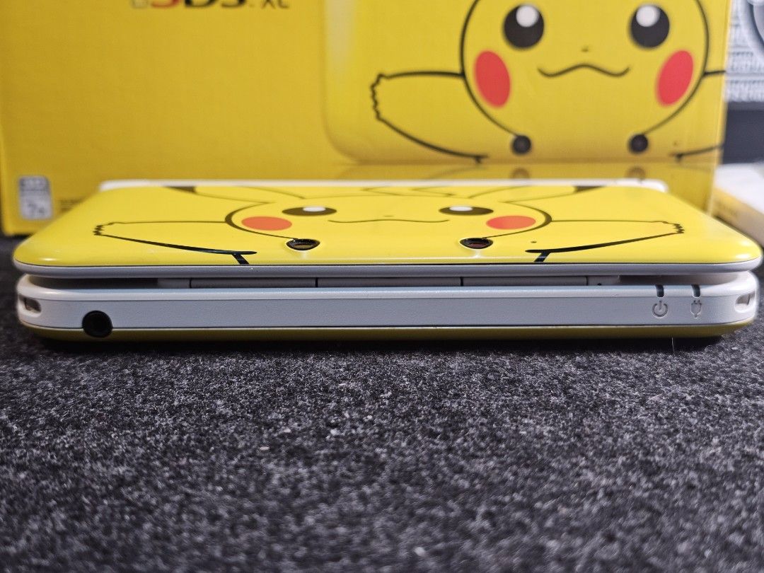 Nintendo 3DS XL Pikachu Yellow Edition (US) (Category: Nintendo) located in Paranaque City. Submitted by john020497 (Listing ID 1336467780, Image 3). Description: - Around 8.5/10 smoothness over all. Good item for collectors. - No issue. - With box, ar cards and manuals. Parañaque area. Delivery via Lalamove/Grab..