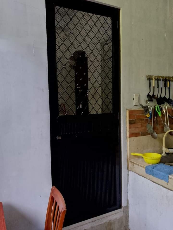 Screen door (Category: Mirrors) located in Mendez-Nunez. Submitted by nca_glass.aluminumfab (Listing ID 1336441001, Image 1). Description: heavy duty screen door.