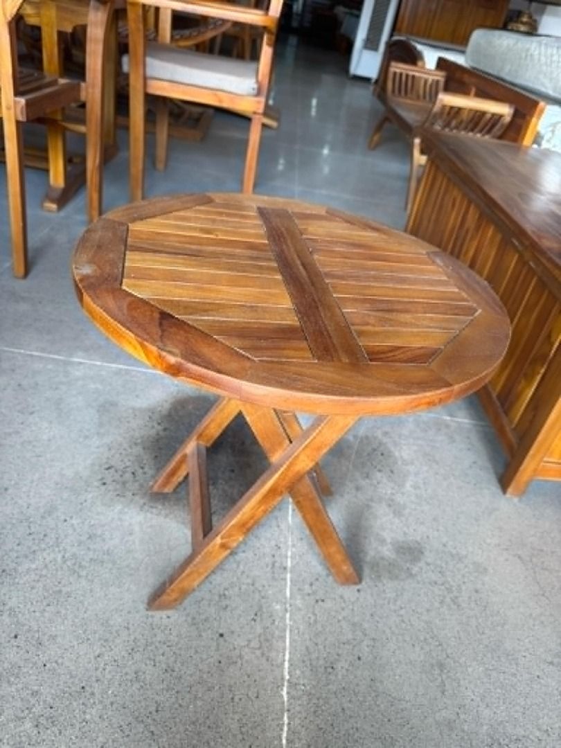 Solid Teak Wood MINI Salur Round Table Furniture (Category: Tables & Sets) located in Quezon City. Submitted by christineahnneee07 (Listing ID 1336385737, Image 1). Description: ITEM: Handcrafted Solid Teak Wood MINI Salur Round Table Furniture SERIES: Gold Teak (Indoor Series) MAIN MATERIAL: Teak Wood (Tectona Grandis) FINISHING: N. Cellulose APPROXIMATE DIMENSIONS: 50 x 50 x 50 cm (size may slightly vary due to its handcrafted nature) PACKAGING
