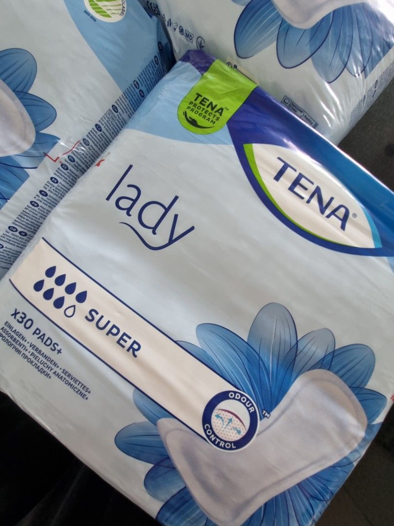 Tena Super Pads - 3 packs (Category: Sanitary Hygiene) located in Singapore. Submitted by charlic (Listing ID 1336331149, Image 2). Description: Bought for $50 for a pack of 3. selling at $15 for pack of 3. One pack is open but not used..
