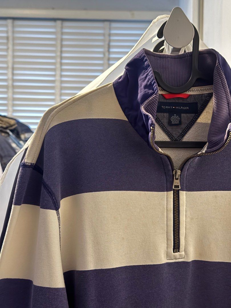 Tommy Hilfiger Striped Half Zip Sweatshirt (Category: Coats, Jackets and Outerwear) located in Pasig City. Submitted by _rajasully (Listing ID 1336411037, Image 1). Description: 🔹Tag size: M 🔹Color: Purple and White 🔹Measurements: Length: 29 inches Width: 21 inches Sleeves: 20 inches 🔹PM me to inquire 😊.