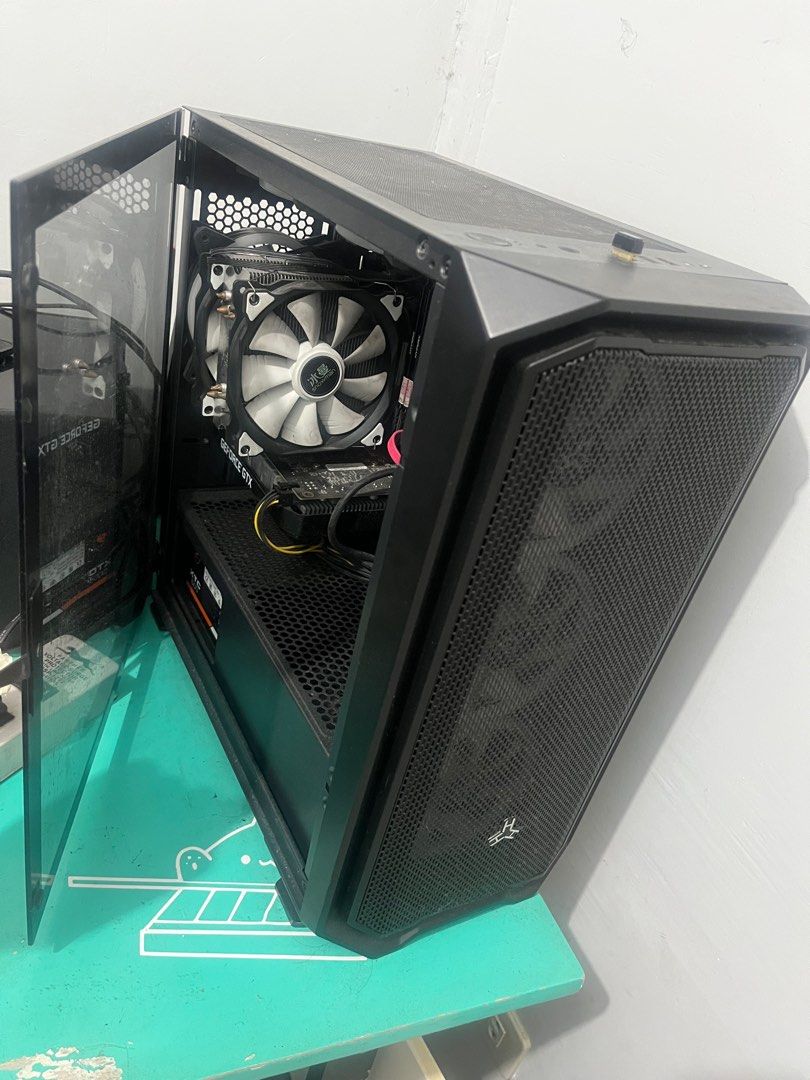 Budget PC (Category: Desktops) located in Binan City. Submitted by arlcl (Listing ID 1336623437, Image 3). Description: Cpu: I3 9100F :with SNOWMAN AIR COOLER MASTER Mobo:GIGAYTE G310 Ram: hyper X 16GB RAM (2x8) GPU: GTX 1650 super Memory: 240GB SSD :1TB HDD Power: COUGAR XTC 80+BRONZE CASE: RAKK HALIYA BLACK Fans 6PCS RGB REMOTE Features: ✅This is my personal PC build is very tipid sa kuryente ✅ Super ganda ng airflow 6 Fans, With RAKK HALIYA CA
