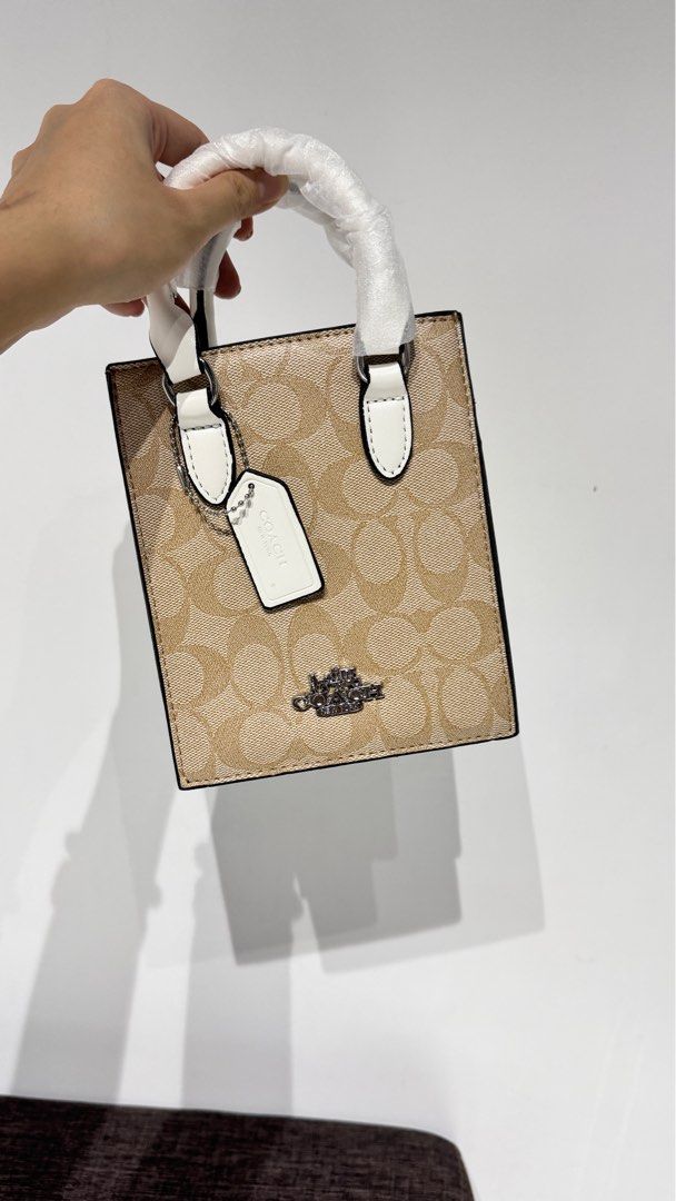 Coach North South Mini Tote Bag (Category: Luxury Bags & Wallets) located in Paranaque City. Submitted by preloved_rrr (Listing ID 1336647360, Image 3). Description: • With dust bag and box • Bangkok Version.