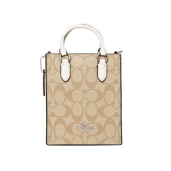 Coach North South Mini Tote Bag (Category: Luxury Bags & Wallets) located in Paranaque City. Submitted by preloved_rrr (Listing ID 1336647360, Image 1). Description: • With dust bag and box • Bangkok Version.