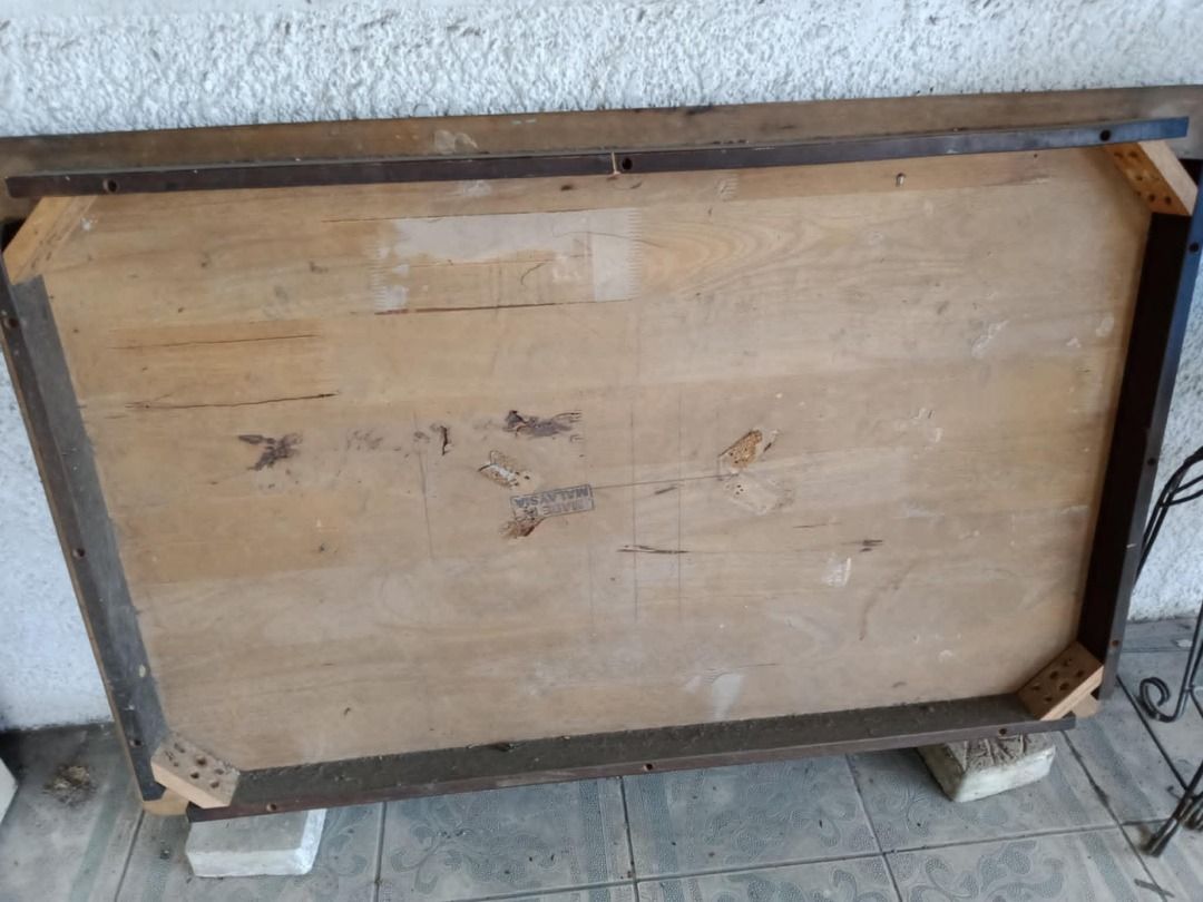 Dining table (Category: Tables & Sets) located in Manila. Submitted by cristev.cristev (Listing ID 1336524092, Image 2). Description: Wooden dining table, dark brown color, 29" wide x 46.5" long, height is 28.5" (Made in Malaysia).