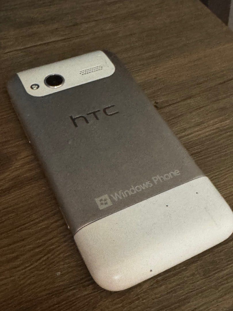 HTC Windows phone (Use for PROP/Display) (Category: Early Generation Mobile Phones) located in Manila. Submitted by natlan.mualani (Listing ID 1336605704, Image 2). Description: Honestly not really good for any other use case. Sim locked to T-MOBILE and can’t connect to computer. Too old for wifi. Still good for maybe camera, music, video. Works well for prop phone..