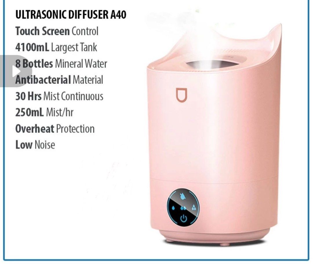 Humidifier Diffuser (Category: Air Purifiers & Dehumidifiers) located in Singapore. Submitted by cherollz (Listing ID 1336616569, Image 1). Description: 4100ml tank that can continuously spray mist for 12hours. Can add in essential oil. Easy to use. .