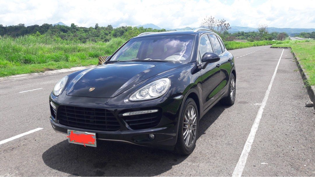 Porsche Cayenne 4.8 Turbo V8 (A) (Category: Used Cars) located in Balagtas. Submitted by wellen07 (Listing ID 1336502667, Image 2). Description: 2011 Porsche Cayenne Turbo, not a standard Cayenne 4.8L Twin Turbo V8 (520-hp, 780-nm torque) 8-speed Tiptronic Air suspension with PASM Local unit, special indent order from PGA. Full options. Factory build sheet available Porsche Servotronic steering Porsche Dynamic Chassis Control (PDCC) 21″ 911 Turbo