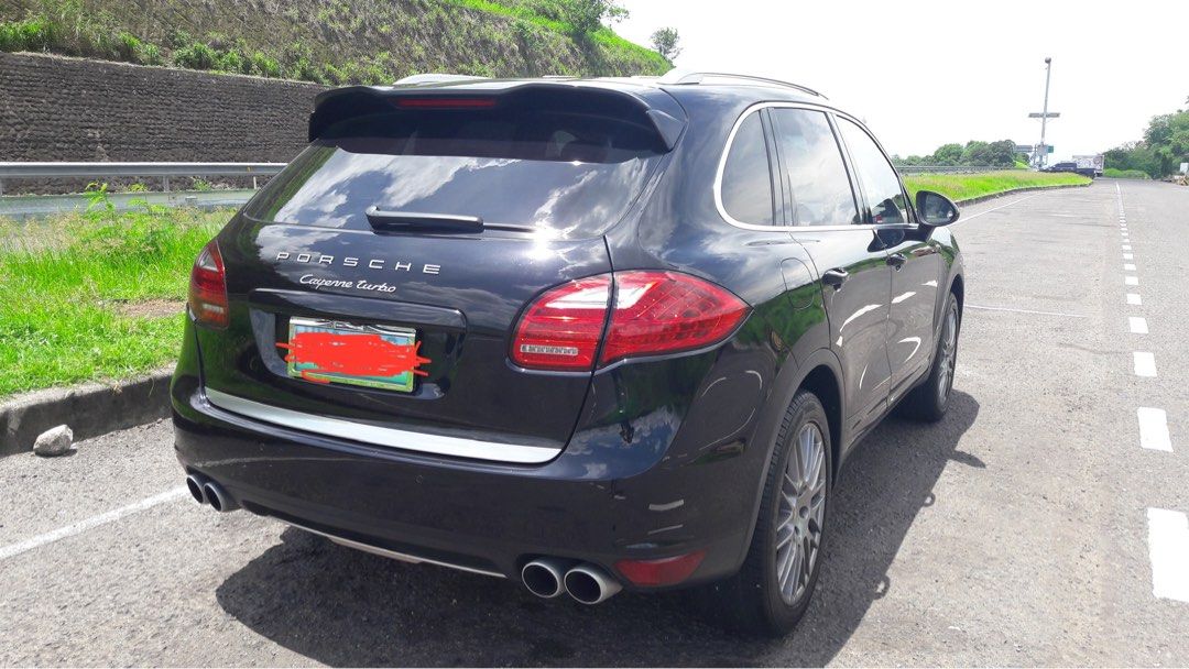 Porsche Cayenne 4.8 Turbo V8 (A) (Category: Used Cars) located in Balagtas. Submitted by wellen07 (Listing ID 1336502667, Image 3). Description: 2011 Porsche Cayenne Turbo, not a standard Cayenne 4.8L Twin Turbo V8 (520-hp, 780-nm torque) 8-speed Tiptronic Air suspension with PASM Local unit, special indent order from PGA. Full options. Factory build sheet available Porsche Servotronic steering Porsche Dynamic Chassis Control (PDCC) 21″ 911 Turbo