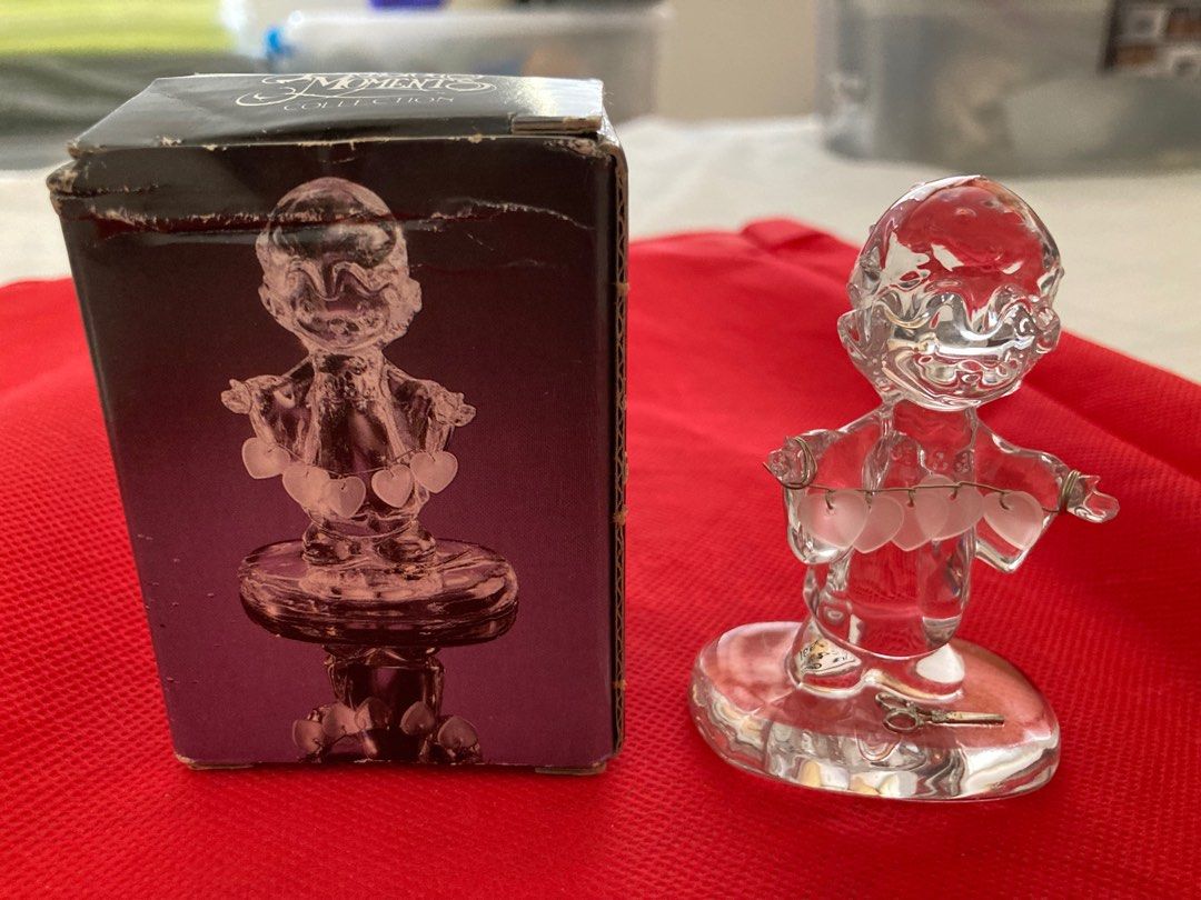 Sam Butcher Crystal child w hearts (Category: Designer & Blind Box Toys) located in Manila. Submitted by declutter4el (Listing ID 1336579361, Image 1). Description: Adorable child holding a string of hearts !! Box a little crushed in storage ! .