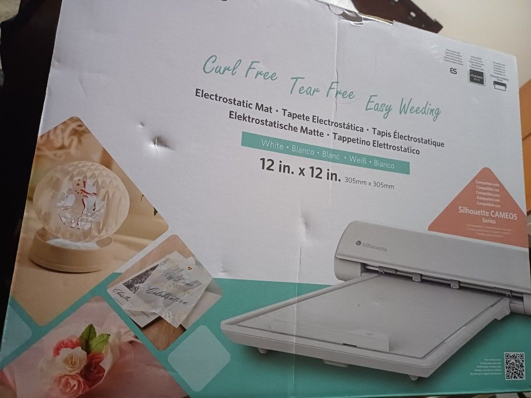 Silhouette Cameo Electrostatic Mat (Category: Office & Business Technology) located in Las Pinas. Submitted by cinalear (Listing ID 1336595249, Image 3). Description: Tested but left marks on actual mat (seen in picture). Still works fine. Includes 2 mats Bought for 8,200. MOP: GCash LOC: Las Piñas RFS: Not suited for thick vinyl materials.