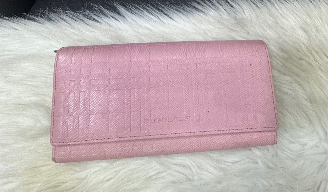 Authentic Burberry (Category: Luxury Bags & Wallets) located in Manila. Submitted by chloe_luxuries (Listing ID 1336828351, Image 1). Description: Guaranteed original Burberry long wallet Still in very good condition No more inclusion wallet only Pm for more details.