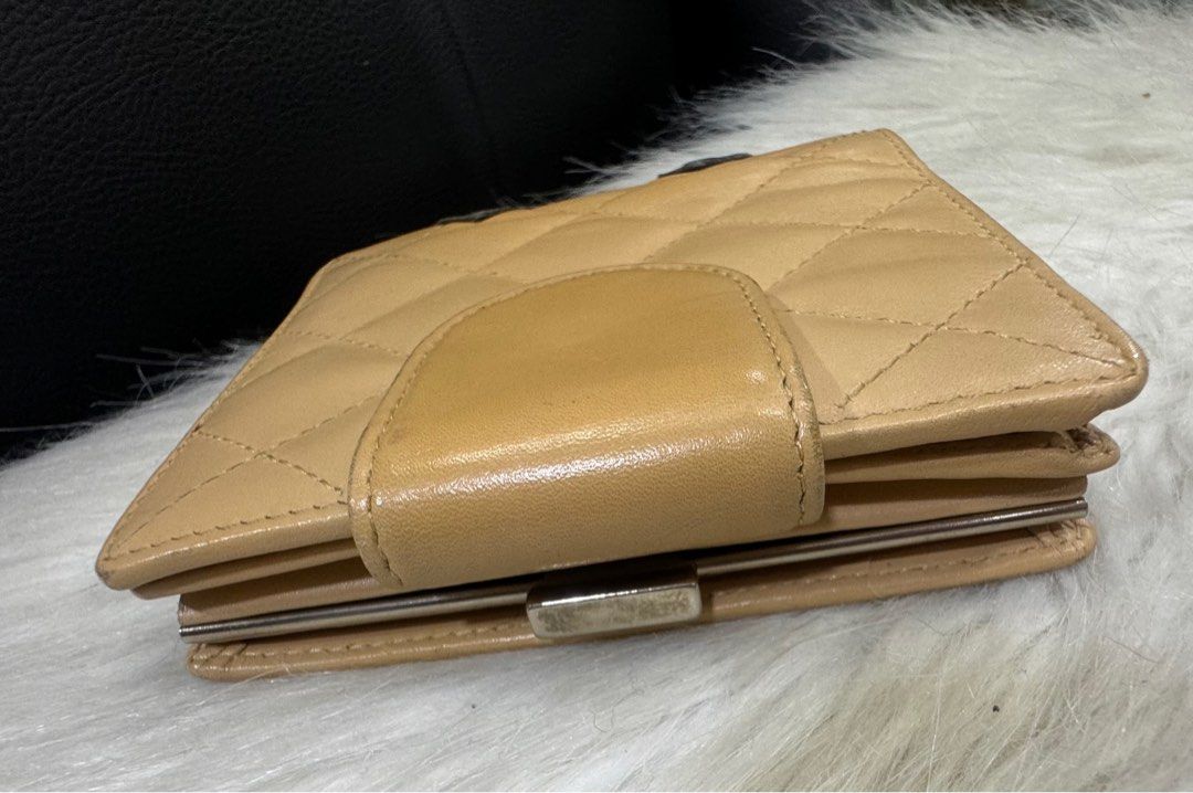 Authentic Chanel (Category: Luxury Bags & Wallets) located in Manila. Submitted by chloe_luxuries (Listing ID 1336840714, Image 3). Description: Guaranteed original Chanel CC bifold wallet Still in good condition with discoloration Holo intact No more inclusion Pm for those interested.