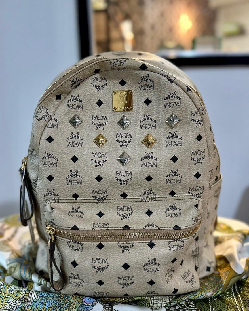Authentic MCM Stark Backpack (Category: Luxury Bags & Wallets) located in Quezon City. Submitted by jhaediah (Listing ID 1336716245, Image 1). Description: MCM Stark Backpack Hardware: sghw Rank: A- Size: medium Material: calf leather Inclusions: provided dustbag .