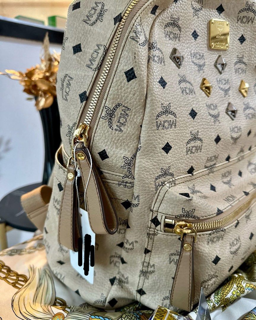 Authentic MCM Stark Backpack (Category: Luxury Bags & Wallets) located in Quezon City. Submitted by jhaediah (Listing ID 1336716245, Image 2). Description: MCM Stark Backpack Hardware: sghw Rank: A- Size: medium Material: calf leather Inclusions: provided dustbag .