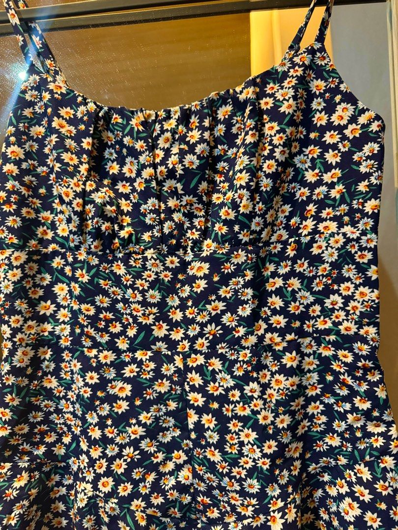 Blue Floral Dainty Romper (Category: Rompers) located in Las Pinas. Submitted by untold.ph (Listing ID 1330474120, Image 3). Description: Good as new! Used in beach once. Color navy blue Very flattering because of the skirt shape :) Zipper on the side Does not fit. Need to declutter Fits XS-Small .