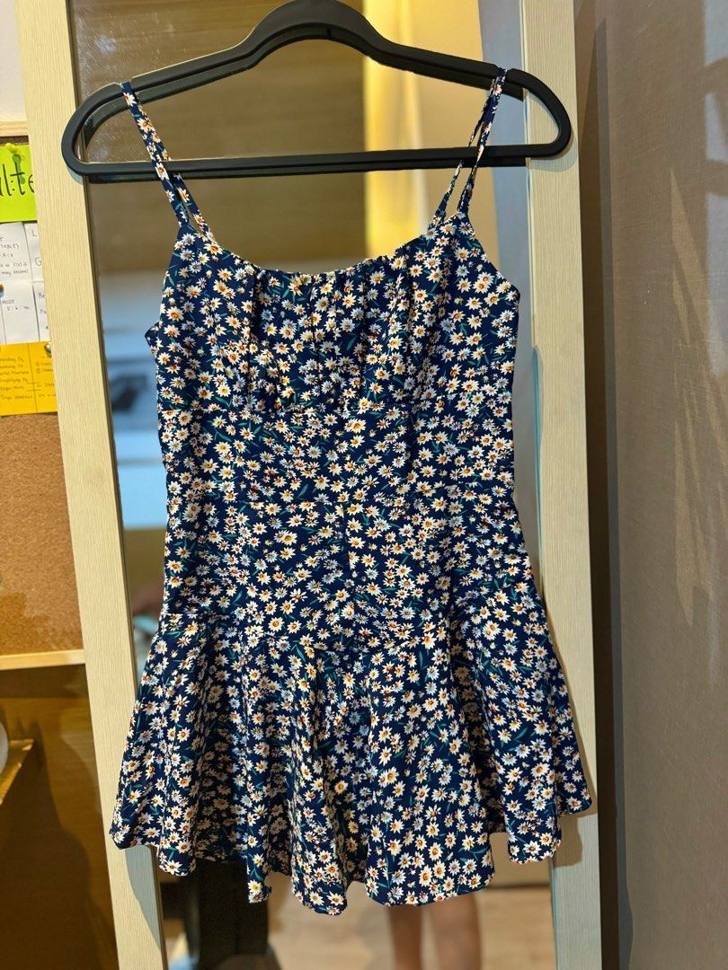 Blue Floral Dainty Romper (Category: Rompers) located in Las Pinas. Submitted by untold.ph (Listing ID 1330474120, Image 2). Description: Good as new! Used in beach once. Color navy blue Very flattering because of the skirt shape :) Zipper on the side Does not fit. Need to declutter Fits XS-Small .