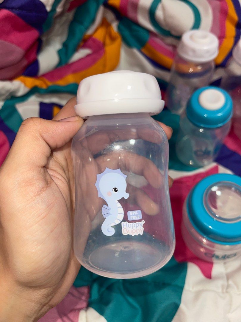 Breastmilk storage bottle (Category: Breastfeeding & Bottle Feeding) located in Manila. Submitted by ysabellebb (Listing ID 1336762777, Image 3). Description: 11pcs storage bottle 5pcs standard neck bottle from huppy buppy 4pcs standard neck bottle from dula 2pcs wide neck bottle from dula.