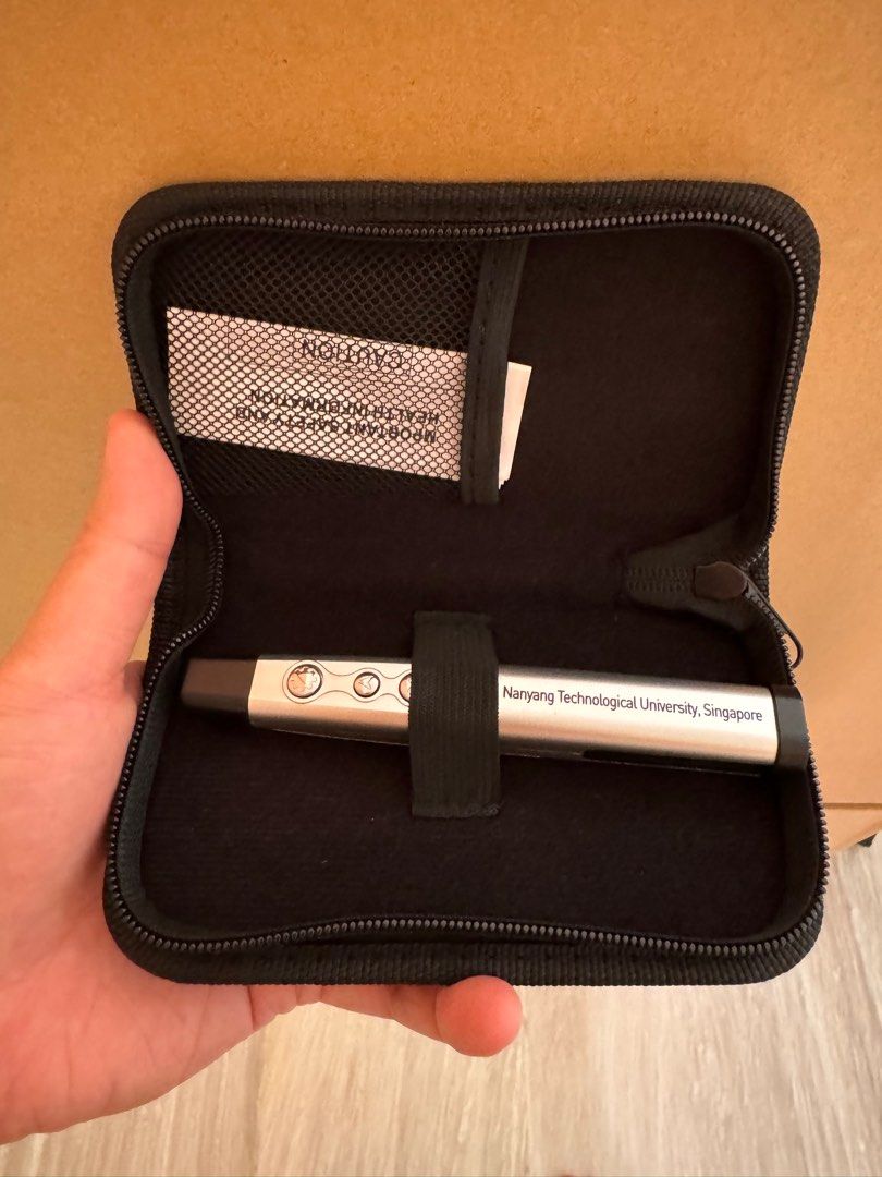 Laser pointer (Category: Other Accessories) located in Singapore. Submitted by thebestforyouonly (Listing ID 1336791509, Image 1). Description: Laser pointer door gift from NTU. Negotiable and pick up below my block. Great set with a pouch. .