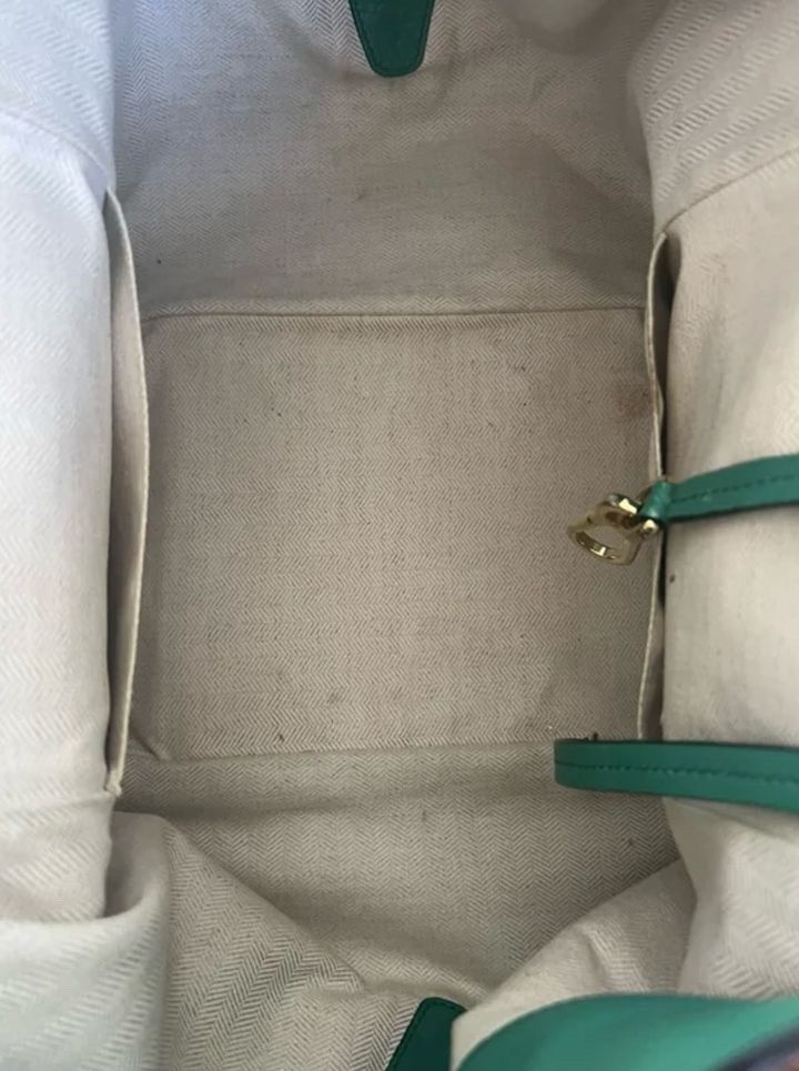 Loewe Hammock Bag - Rare Colorway First Edition (Category: Luxury Bags & Wallets) located in Makati City. Submitted by jasch21 (Listing ID 1336729400, Image 2). Description: Brand: Loewe Model: hammock leather handbag, muticolored bag, zip on sides, Packaging: With dust bag and Loewe card Size: medium Store price: P200K and up Selling price: P80K RFS: I don’t use it anymore, extra cash. Condition: Good condition though minimal scratches, polishin