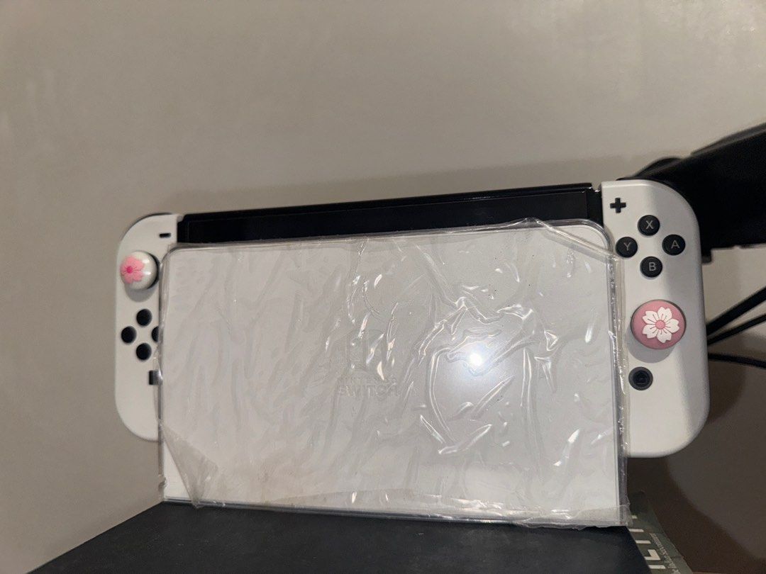Nintendo OLED BUNDLE with 10 GAMES (Category: Nintendo) located in Paranaque City. Submitted by cheska_ (Listing ID 1336839063, Image 3). Description: ONLY SELLING AS BUNDLE!!!! Nintendo OLED BUNDLE WITH Inclusions! 10 GAMES and Skull & Co. CASE - Pokemon Arceus - Pokemon Brilliant Diamond - LA Noire - Animal Crossing - Super Hero Girls - NBA 2K19 - Cities Skylines - Mario Party Super Stars - Grand theft auto (Trilogy) - Assassins Creed (The Rebe