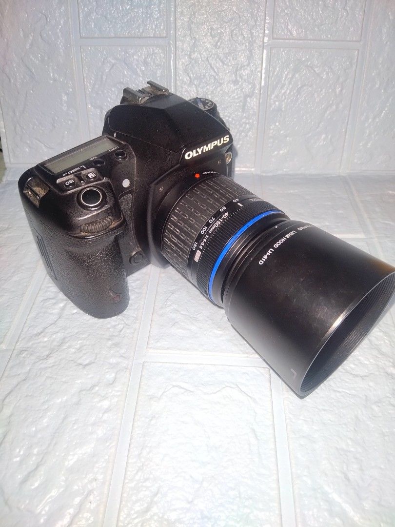 Olympus E30 DSLR Camera with 40-150mm Zoom Lens (Category: Cameras) located in Quezon City. Submitted by Mr._Vintageous (Listing ID 1336732671, Image 1). Description: For Sale! Olympus E30 DSLR Camera with Zuiko Digital 40-150mm f/4-5.6 Lens. Semi-Pro Camera. 12 Megapixels CMOS Sensor. In Body Image Stabilizer. Articulating 2.7 inch LCD Screen. With built in Sensor Cleaning. With Live View Capability. 5 Frames Per Second Shooting. Built in Flash 