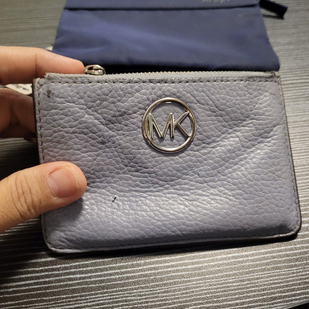 Preloved mk small wallet (Category: Luxury Bags & Wallets) located in Bulacan. Submitted by butterflym60701 (Listing ID 1336800671, Image 1). Description: in good condition . authentic.