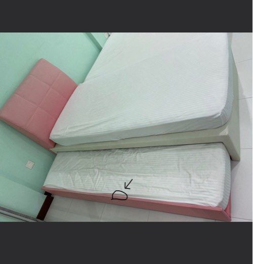 Pull-out Bedframe (Category: Bedding & Towels) located in Singapore. Submitted by traderman (Listing ID 1336719607, Image 1). Description: Pull-out bedframe to let go. Clearing off my stuffs. The defects as you can see in the 1st and 2nd pics Placed it at your child’s room, spare room, your room also can (if you don’t prefer one big mattress), rental room, used it for your temporary stay or even guest room. Frame colour black and pink because of 