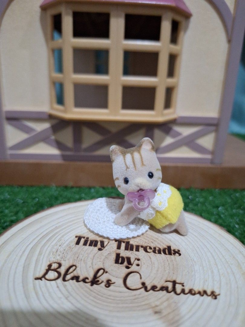 Sylvanian family Baby Cat (with nonSF pacifier+mini mat) (Category: Infant Playtime) located in Cavite. Submitted by Mavee (Listing ID 1336853349, Image 1). Description: Like new Sylvanian baby crawling cat with pacifier(non sylvanian but scale) and free handmade micro baby mat..
